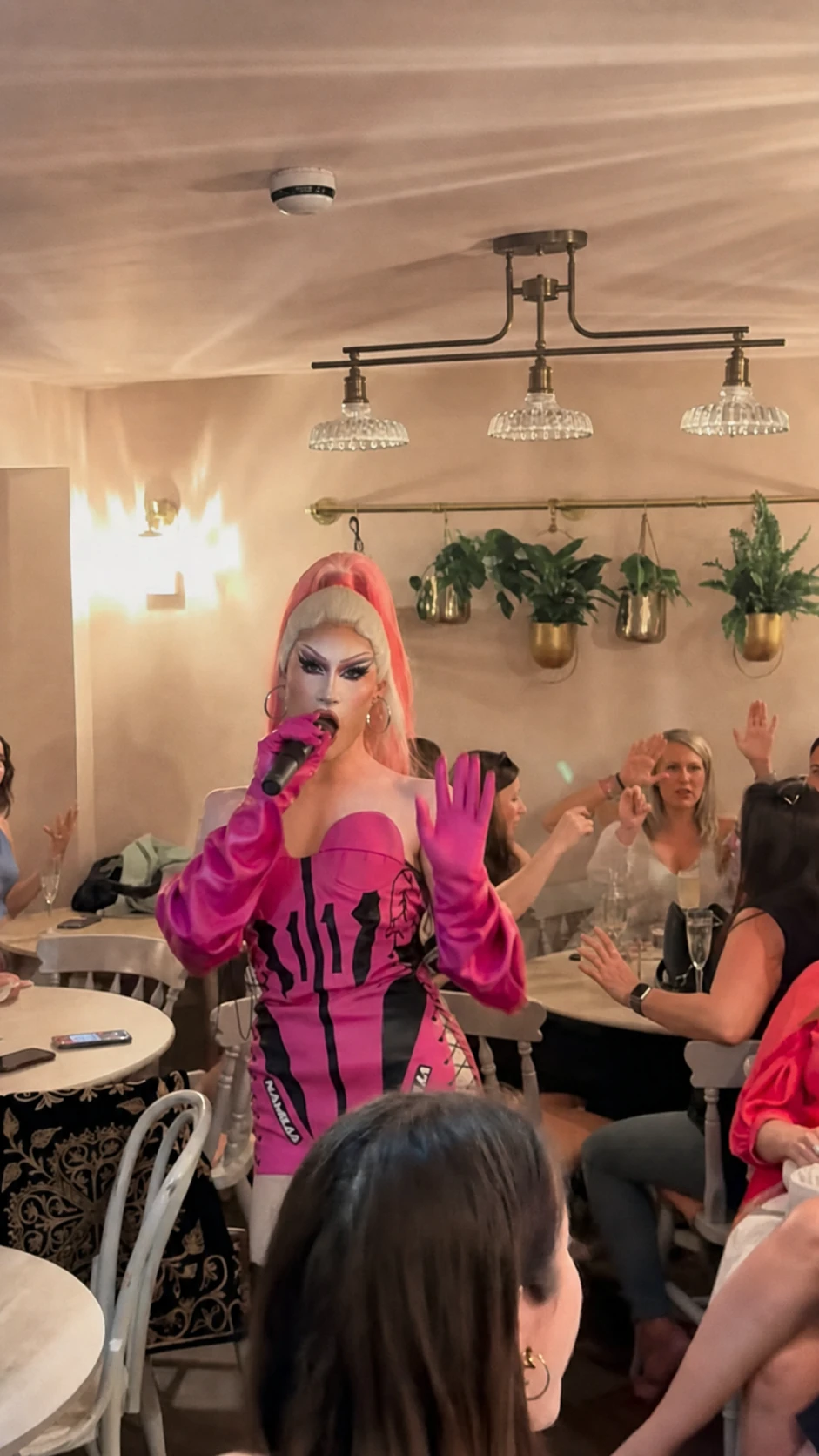 A live performance during an evening event at Sonder
