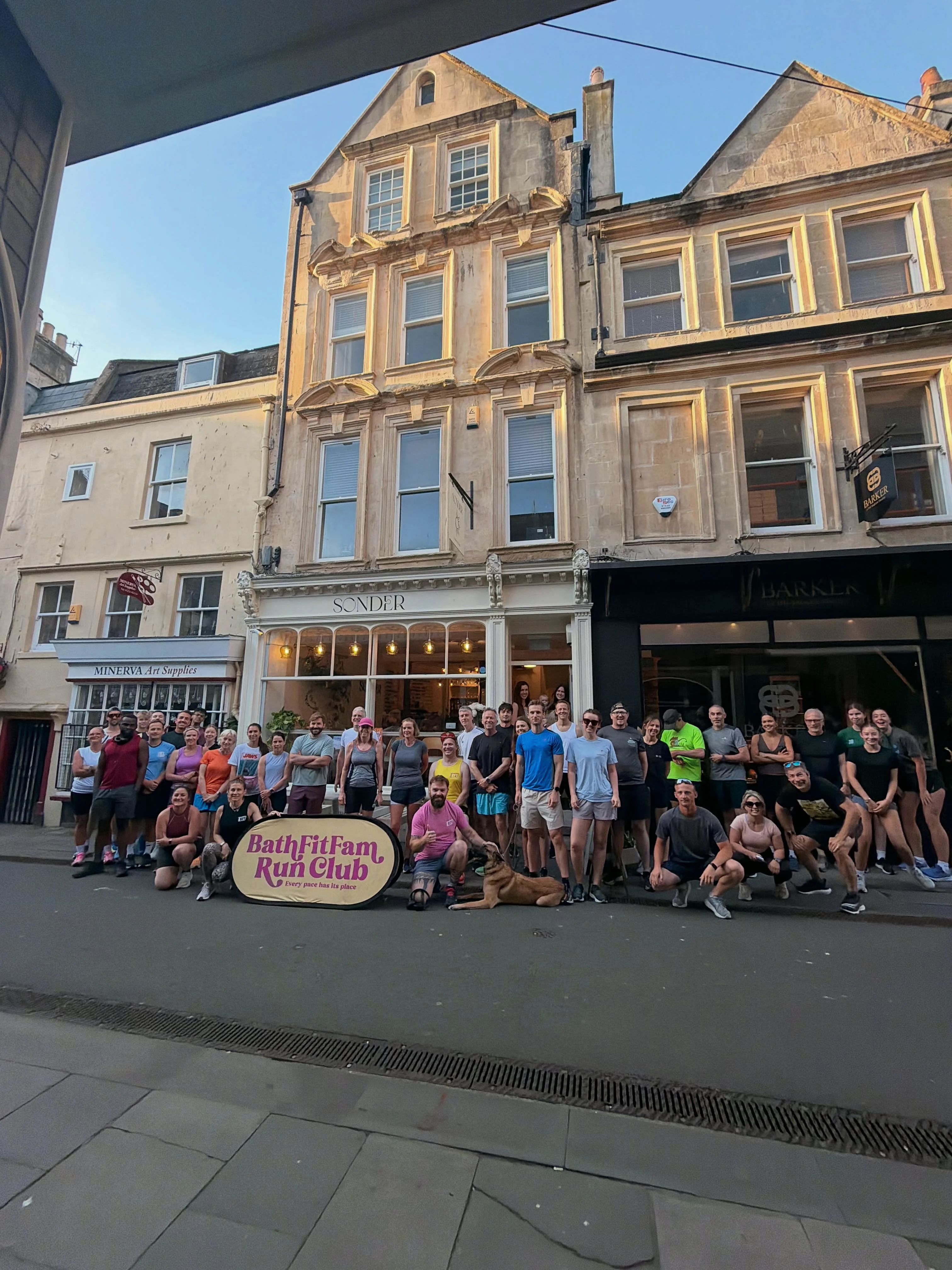 A local run club gathered outside Sonder Coffee & Events